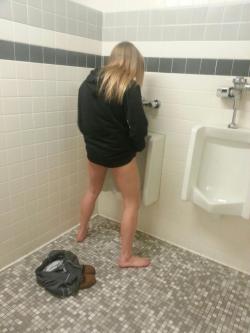 urinalchicks:  Ellie’s first attempt at peeing in the urinal. Never laughed so hard in my life. 