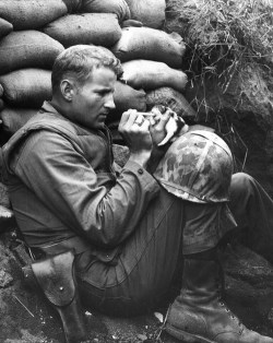 lipstickandleeches:  If you were having a bad day, here’s a picture of a Marine feeding canned milk via medicine dropper to an orphaned kitten during the Korean War. 