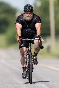Big, burly, bearded guy on my kind of bike!
