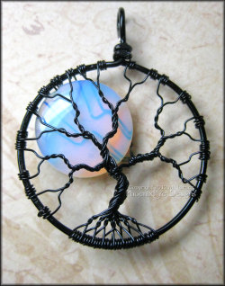 wickedclothes:  Rainbow Moonstone Tree Of Life / Full Moon Necklace Crafted using wire-wrapping techniques, this tree of life pendant holds a full moon in its branches. The moon is made out of rainbow moonstone, a beautiful, smooth gemstone with a light
