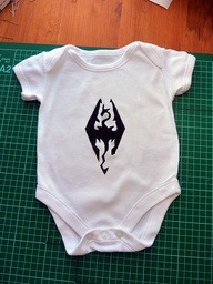 thegamedraw:  Skyrim Onesie #skyri http://bit.ly/YiFEOJ  My neighbors would want this for their kid.