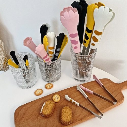 takemyyen:  iloveswedishmeatballs:You know I’ve never really cared for over the top kitchen accessories, but there’s just something about cat paws for tongs that hits different….I WANT THEM ALL!! Who needs cat paws for tongs, when I can literally