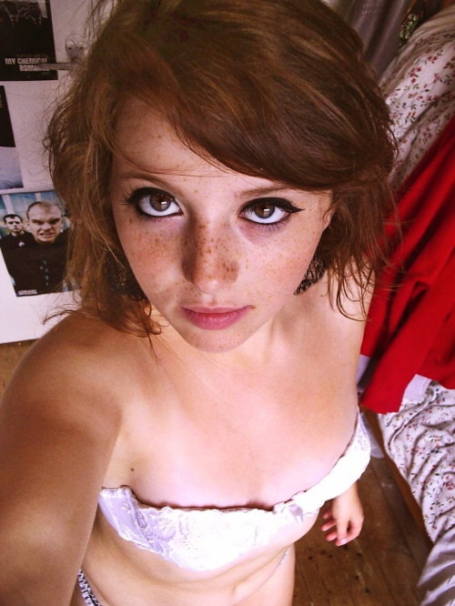 Cute freckled teen girl