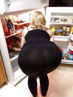 skimpymoms: Whenever my mom gets something out of the refrigerator, she bends over in a really exaggerated, slutty way that makes you just want to teach that bitch a lesson by ripping open her tights, leaning her over, and fucking the shit out of her