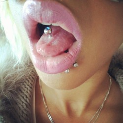 useherthroat:  bimboz:  johndwrite:  bimbobuildingblox:  This is what I expect from a bimbo mouth. A tongue stud. It has only one benefit which is that this tongue can now deliver enhanced pleasure. The other piercings by her lip look really sexy - they