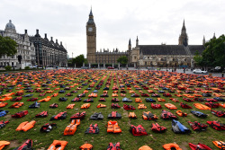 micdotcom:  Londoners awoke Monday morning to find the city’s Parliament Square, in the shadow of Big Ben, filled with empty life jackets. “Life jacket graveyard” is a tribute to refugees who have drowned trying to come to Europe. The powerful