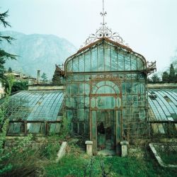 thefabulousweirdtrotters:Abandoned Victorian Style Greenhouse, Villa Maria, in northern Italy near Lake Como. Photo taken in 1985 by Friedhelm Thomas.(Source) 