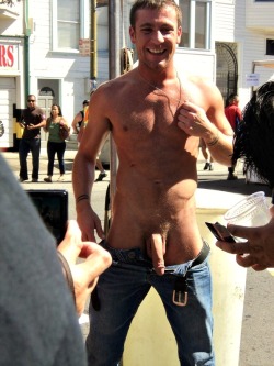 riskyinpublic:  Showing off his nice cock to strangers on the street! 