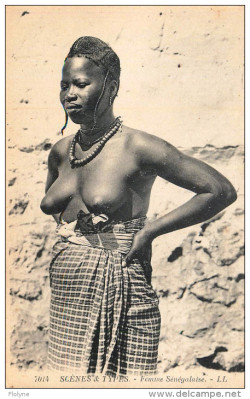   Senegalese woman, via Delcampe.   