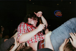 tinymovingfarts:  brian sella from the front bottoms crowd surfing 