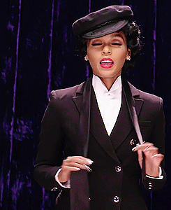 12graphics:   Janelle Monaé Ties a Windsor Knot While Impersonating a Puppy