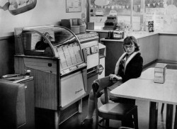 vaticanrust:Girl with a jukebox at a Dairy Queen in Austin, Texas, 1963.  Photo by Thomas Hoepker.