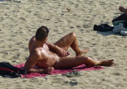 unclenifty:  horny dad watching his son surf at the nudist beach 