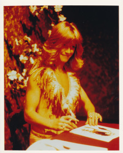 Signing autographs, circa 1982 Visit Private Chambers: The Marilyn Chambers Online Archive