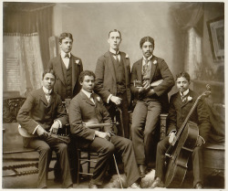 onceuponatown:      Summit Avenue Ensemble, Atlanta, Georgia. 1899. Photograph shows a group of six young men posed with their instruments in the photographer’s home studio on Summit Avenue, Atlanta, Ga. From left: the photographer’s twin sons Clarence