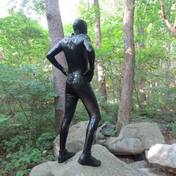 northernleather:  apaaps:  On the rocks in full rubber enclosure. Libidex Neo Catsuit KinkEngineering Micro Breathe Hood.  Nicely formed gimp 