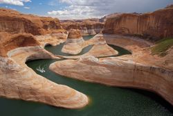 Reflection Canyon, part of Lake Powell in Glen Canyon. The &ldquo;bathtub rings&rdquo; on the walls show past water levels. The lake has shrunk so much due to recent drought that an estimated 4.4 million gallons of water have been lost. The two lower