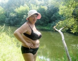 nudeoldladies:  Gorgeous flabby old senior in black lingerie poses down by the pond!Find your sexy old senior here!