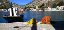 Boat and nets by Marite2007 on Flickr.Boat and nets Seashore with colorful nets and scenery. Kastellorizo island, Dodecanese, Greece