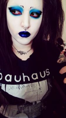 deathrock:  dracmakens:  My makeup for today. Really wanted to wear out one of the occ lip tars I got a sample of the other day and also recreate the lovely deathrock ‘s bat wing eyeliner and this is what I came up with. I used urban decay and lime