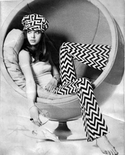 mangodebango: Model wearing chevron bell-bottom pants &amp; cap sitting in an “egg” armchair designed by Eero Aarnio, 1960′s.