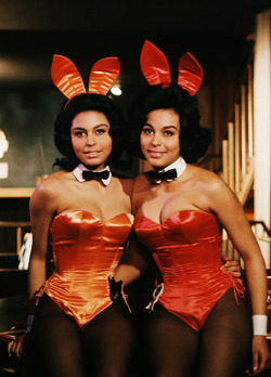 blackhistoryalbum:  BLACK GIRLS ROCK IN A “MAD MEN” WORLD | 1965 [REDUX] Jennifer Jackson (Miss March 1965) pictured with her twin sister Janis when they worked as Bunnies at Chicago’s Playboy Club… Janis is on the left, Jennifer on the right.