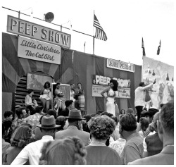 Vintage press photo taken at the 1951 ‘Texas State Fair’ features the Talker firing up the crowd, from the Bally stage.. In a flagrant example of Carnival circuit shenanigans, owners billed “Lillie Christeen - The Cat Girl” as the show headliner?