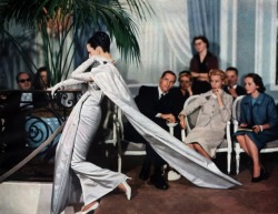 thejsbeauty:Dovima at Christian Dior show in his Paris salon, 1956.