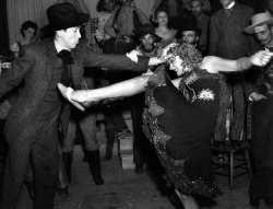 Sherman Clark - Marlene Dietrich kicks ineffectually at James Stewart during a saloon fight in the film Destry Rides Again, 1939.