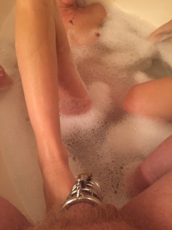 dontcrycuck: Foot massage for her while she soaked in the bath. Plus a couple of kicks to my swollen balls.  She also told me about a guy she’s been messaging that has a huge cock and a bigger ego. She is wanting to meet him this next Friday night.