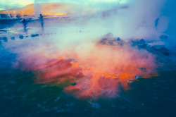 photojojo:  4,320 meters above sea level in the mountains of Chile, the El Tatio geyser has been spewing scalding hot steam for thousands of years.  Photographer Owen Perry traveled to the remote region and captured some incredible photos of the geyser