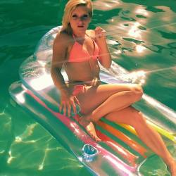 TayaRaee in this candy colored pool shot