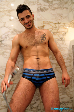 chrishotrod2000:  Aro Damacino is from the Middle East and is 26 years old. His first  photo session happened in  Bentley Race’s hotel bathroom. Aro stripped down to his  jocks in the bathroom before eventually he  worked his way in to the shower and