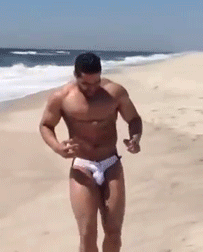 dudeswithswag:  running on the beach My dude doesn’t like guys in thongs but I do… Look at his junk bouncin around… Wish I was the front part… LOL boitube.com  