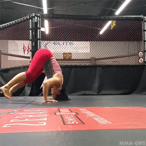 mma-gifs:  “Coach Lenny having us do drills that will strenghten the neck, back, and legs! Great drill for wrestling and MMA!” - Michelle Waterson 