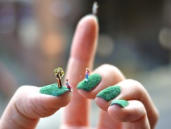 positivemotivation:  Alice Bartlett created a green, grassy world for her miniature creations, literally at the tips of her fingers.  Her nail dioramas are made of green flocking, which she cut to fit perfectly over her fingernails.  She then artfully