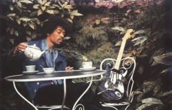 thrasudeilh:-Jimi Hendrix having tea with his guitar in London 1970