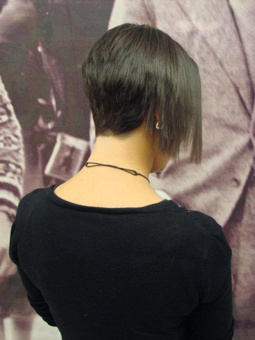 Asymetrical bob with a well blended nape.