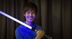 theinfogeekblog:  This Company Makes Lightsabers You Can Actually Fight With http://ift.tt/1YquDtU  This article, This company makes lightsabers you can actually fight with, originally appeared on CNET.com. Sabermach Jay Chen proudly poses with one of