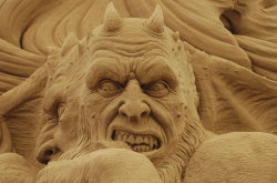 sixpenceee:  These Dante’s Inferno sand sculptures are from the International Sand Sculpture Festival. It’s held in Venice, Italy, on the beach of Jesolo Lido. 2,000 tons of sand were used to craft 24 different scenes from the 9 circles of hell