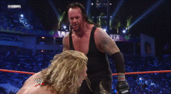 wrestlingchampions:On this day: Undertaker inadvertently takes out the referee and then overcomes a low blow, shot to the head with a camera, interference from The Edgeheads and two Spears to surprise Edge with Hell’s Gate to score the tap out, his