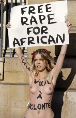 whitehumiliation: breedingthewhitesaway:  blackbreedingonly:  A European woman protesting in support of increased African immigration.  Oh nice   This a worthy fight. Foreigners like African Immigrants shouldn’t live under the tyranny of  the whites’