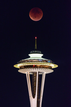 yourtake:    Contributor Tim Durkan carried four cameras to grab the perfect shot of the #superbloodmoon as it sailed over the Space Needle in Seattle. More photos of the supermoon lunar eclipse:  