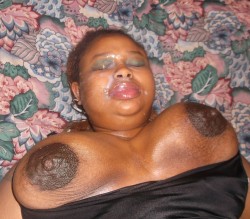 ghettohoesofcali:  This is Pig with my cum on her face. I called it Pig Snot. She was a nasty Nigga Slut but she did have some good pussy. I like nasty ghetto looking, black nasty hood rats. Im looking for other pics of hoe’s I have.