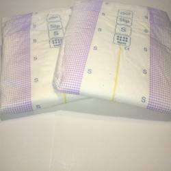 abdlmarketplace:  Tena Slip may not be a cute design but they are a great all in one nappy. Available in S M L. We are thinking of putting some sort of cute plastic sticker down the middle to make them cute, would that make them better? Turns a cheap