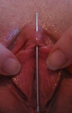 pussymodsgaloreBDSM pain games, needle through clit - or is it? Sorry to disappoint but I think she already has a VCH piercing, and the needle is under her hood, over her clit, and out through her existing piercing hole. Anyway, it looks good, and her