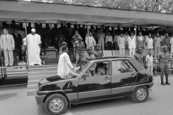 historium:Burkina Faso president Thomas Sankara in front of his Renault 5 during an official ceremony for the second anniversary of Burkina Faso’s revolution. Sankara ordered to replace the official fleet of Mercedes with cheaper Renault 5. Ouagadougou,