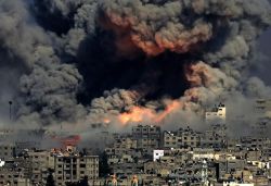 necdeep:  stunningpicture:  New photo from Gaza today looks like actual hell on earth  What is going on in Gaza at the moment is the most disgusting thing i have ever heard. When I hear people actually justifying what is going on by saying things such