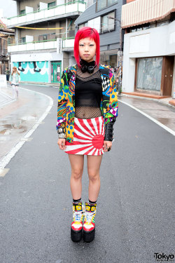 tokyo-fashion:  20-year-old Momoko on Cat Street in Harajuku with lots of piercings (ear spike, stretched ear, labret, eyebrow, tongue, navel), Glad News top, HellcatPunks skirt &amp; Jeremy Scott winged sneakers with tall platforms. She’s also wearing