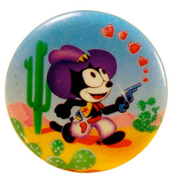 4colorcowboy: Metal button with Felix the Cat in cowboy garb, Lisa Frank Inc., 1981.